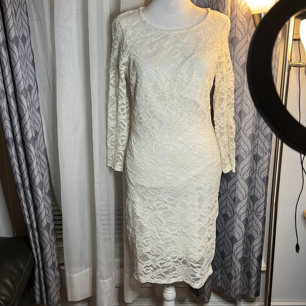 Women’s white dress with silver sparkle detail